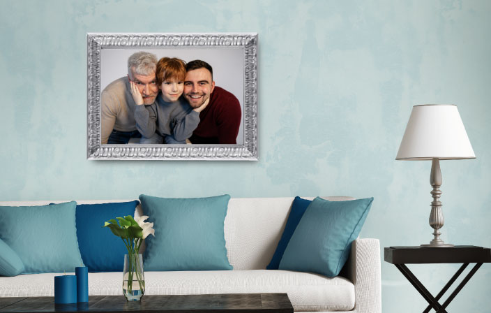 Baroque Silver Stained wood frame H263, with family portrait, placed in interior of blue tones. Picture frame producer Debex Suisse.