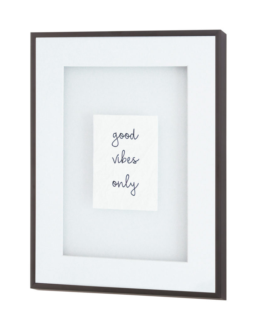 Good vibes only framed wall art in a dark brown wooden frame